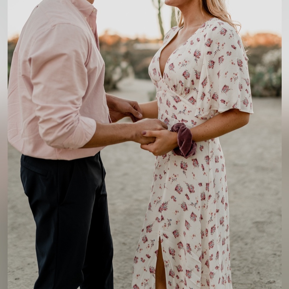 AFRM floral dress. Size medium short sleeve with slit dress